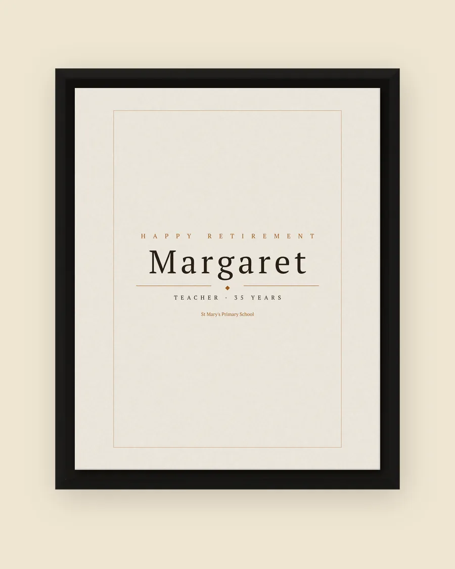 The name print on a canvas in a black frame: HAPPY RETIREMENT above the name Margaret, then TEACHER · 35 YEARS and St Mary's Primary School, set in type.
